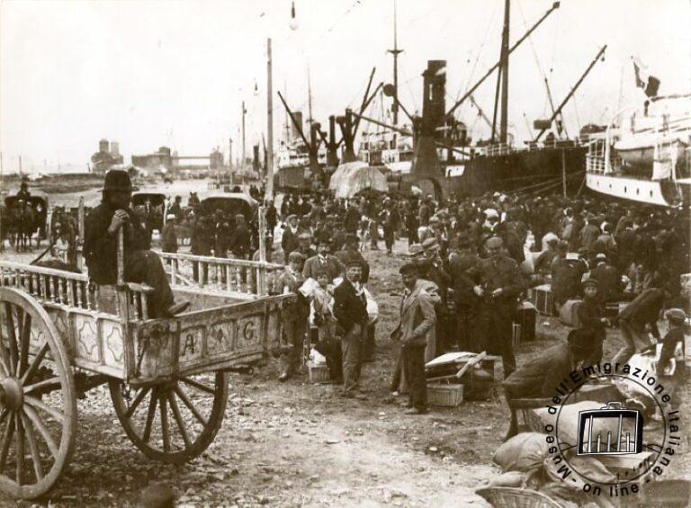 Argentina, Buenos Aires, early 1900s. Carts carrying immigrants ashore. The ship was berthed offshore and immigrants were brought close to shore in large boats. They were then transferred on to carts waiting in the shallows and were able to reach dry land without having to wade ashore.